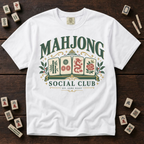 Mahjong Social Club t-shirt in Violet, flat lay on white wood