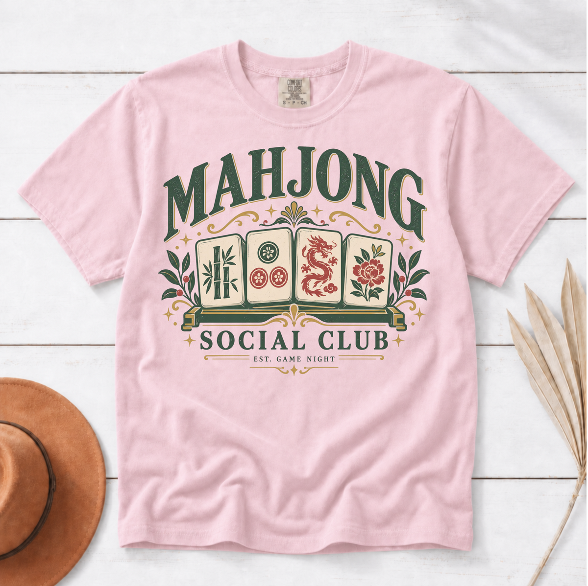 Mahjong Social Club t-shirt in Ivory, flat lay on white wood