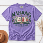 Mahjong Social Club t-shirt in Blossom, folded mockup on white wood
