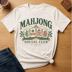 Mahjong Social Club t-shirt in White, flat lay on white wood