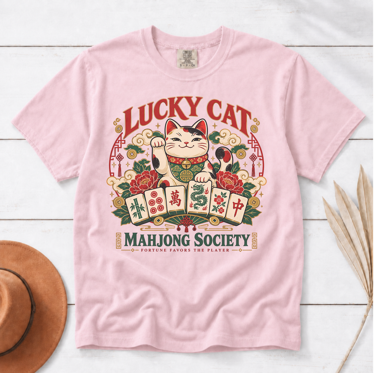 Lucky Cat Mahjong Society t-shirt in White, flat lay on white wood