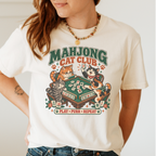 Mahjong Cat Club t-shirt in White, flat lay on white wood