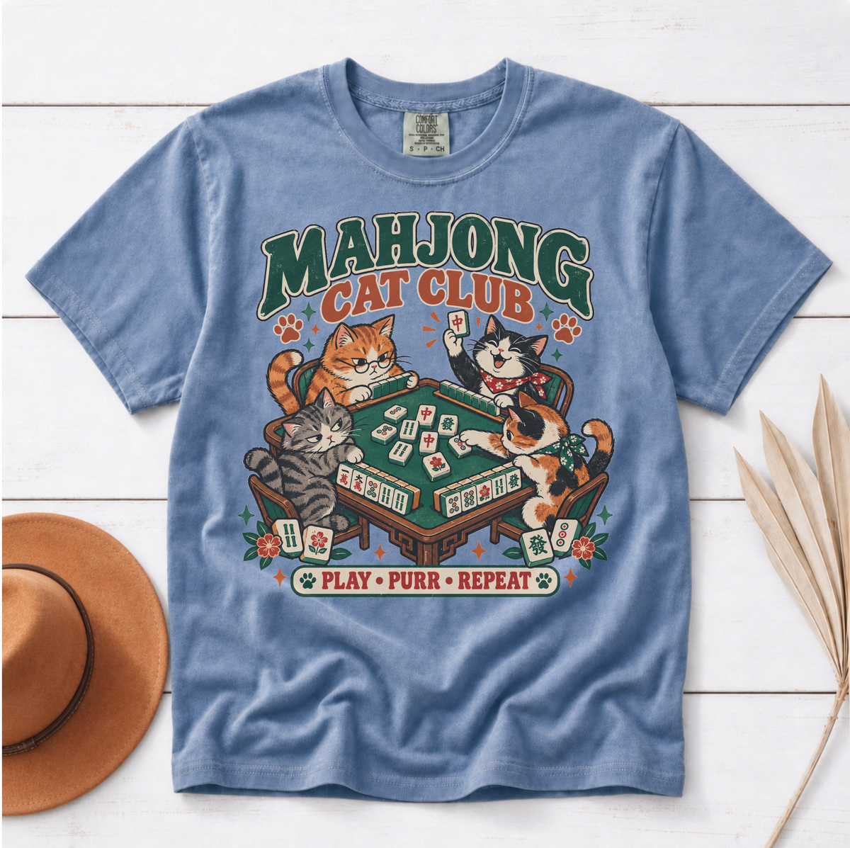 Woman wearing the Mahjong Cat Club t-shirt in White