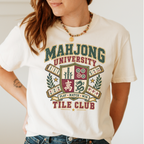 Mahjong University Tile Club t-shirt in Blossom, flat lay on white wood