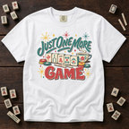 Just One More Game mahjong t-shirt in White, flat lay on white wood