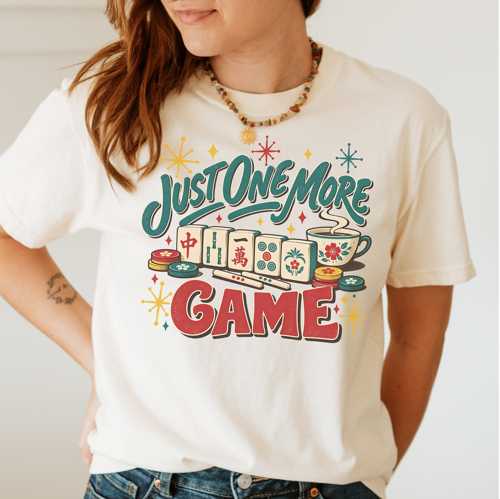 Woman wearing the Just One More Game mahjong t-shirt in White