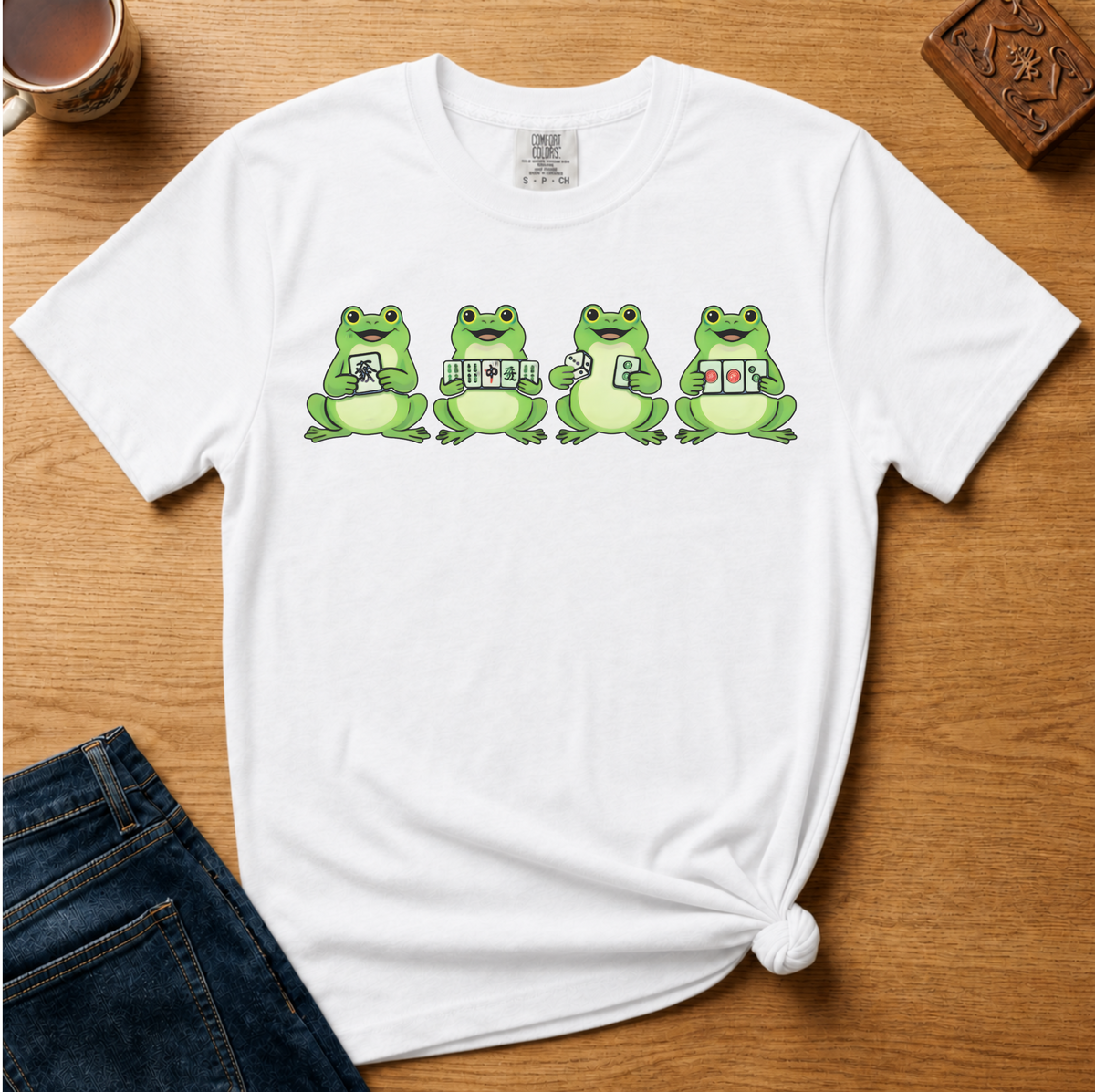 Mahjong Frogs Shirt in Blossom - frogs playing mahjong design on a pink Comfort Colors 1717 tee, flat lay