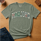 Close-up of the Mahjong Varsity design in Black - tile-patterned MAHJONG lettering with EST 2026 and Mahjong Club