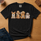 Mahjong Dogs Shirt in Ivory - four cartoon dogs holding mahjong tiles on an ivory Comfort Colors 1717 tee, flat lay
