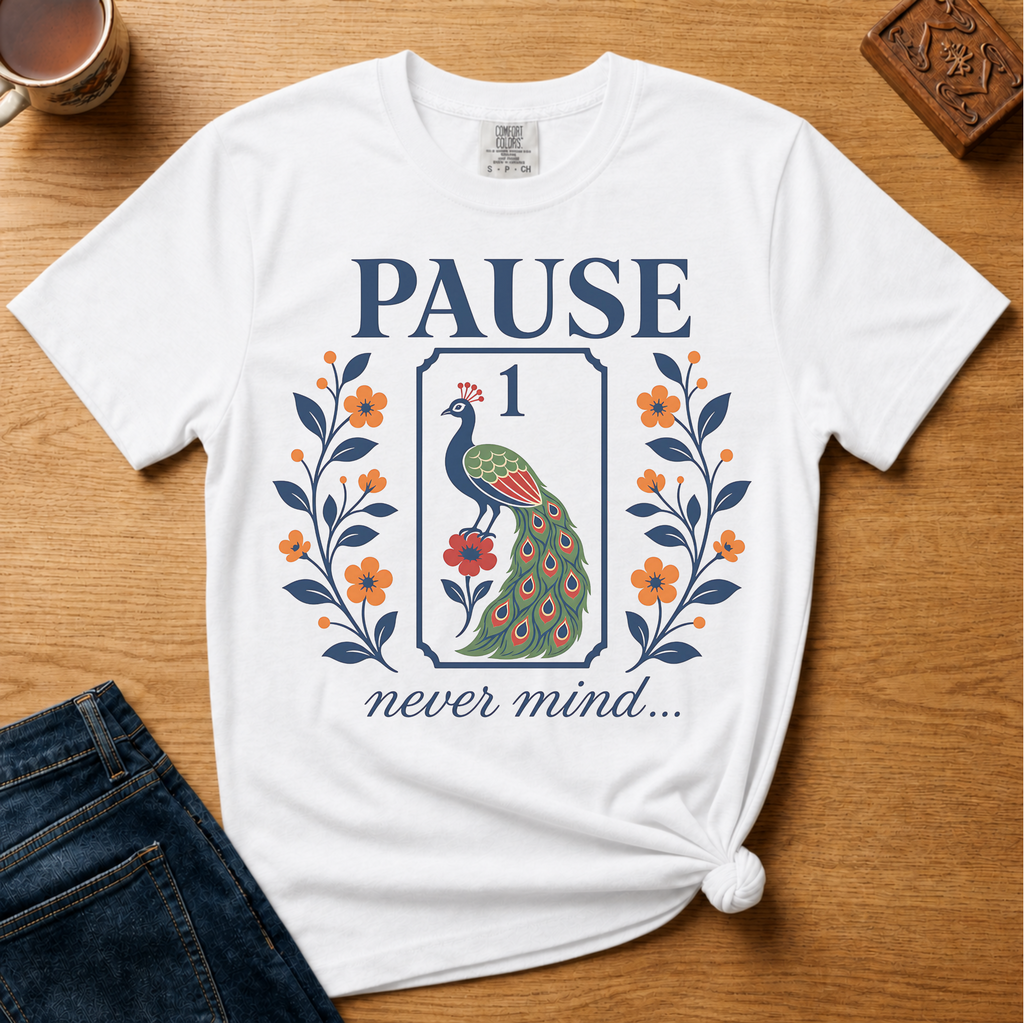 Pause Never Mind Peacock Shirt in Jean Blue - one-bam peacock tile design on a blue Comfort Colors 1717 tee, flat lay