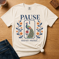 Pause Never Mind Peacock Shirt in Blossom - one-bam peacock tile design on a pink Comfort Colors 1717 tee, flat lay