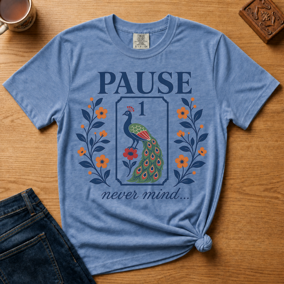 Pause Never Mind Peacock Shirt in White - one-bam peacock tile design on a white Comfort Colors 1717 tee, flat lay