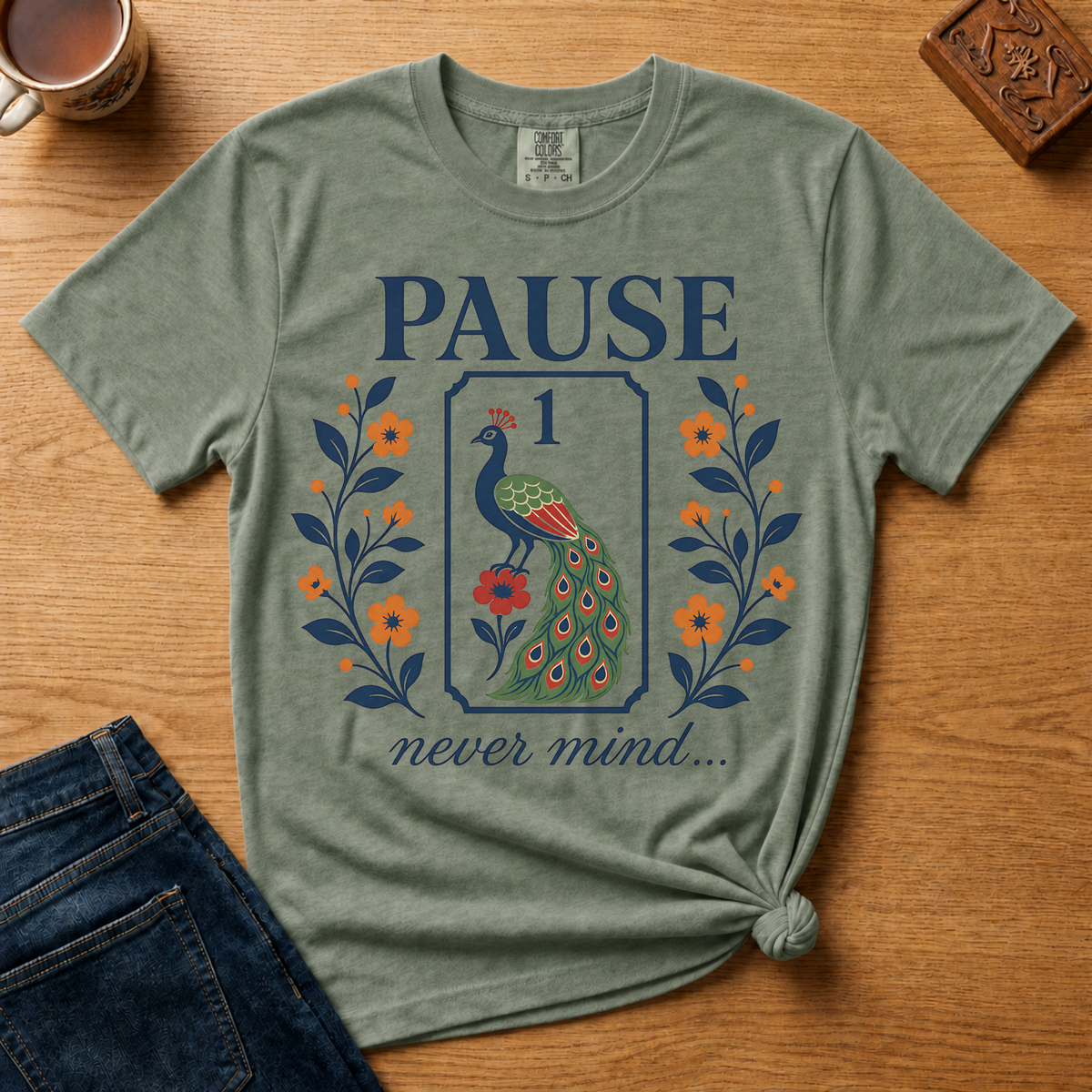 Close-up of the Pause Never Mind peacock one-bam tile design