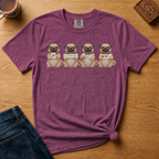 Mahjong Pugs Shirt in White - four cartoon pugs holding mahjong tiles on a white Comfort Colors 1717 tee, flat lay