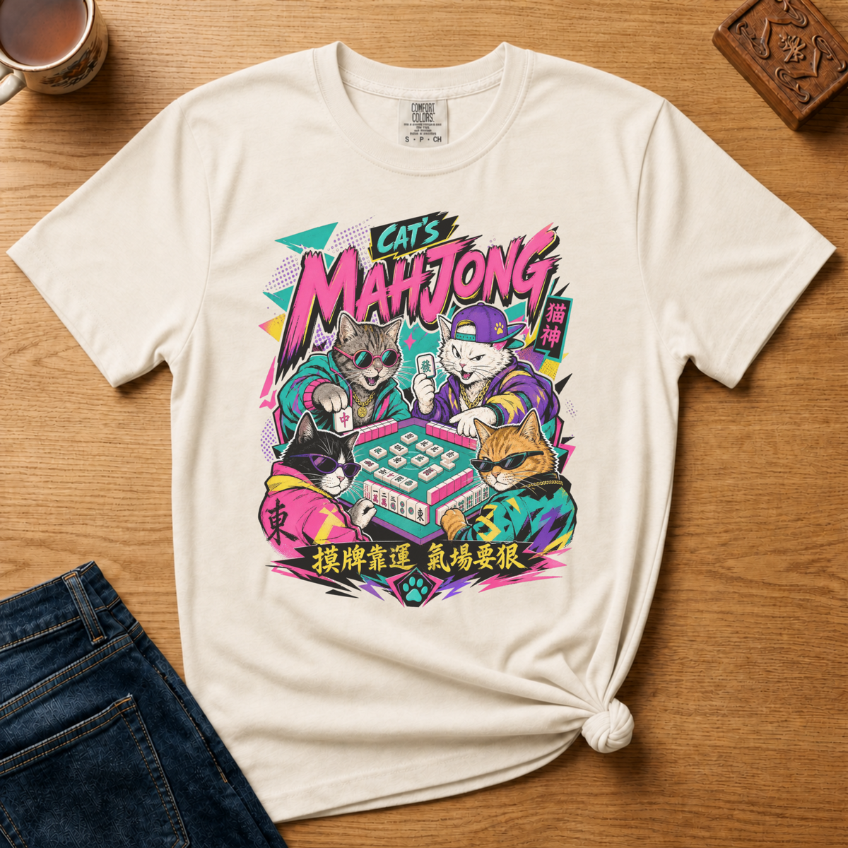 Retro 90s Mahjong Cats Shirt in White - four streetwear cats playing mahjong in retro anime style on a white Comfort Colors 1717 tee, flat lay