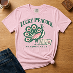Lucky Peacock Mahjong Shirt in Ivory - green and pink peacock with mahjong tiles on an ivory Comfort Colors 1717 tee, flat lay