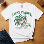 Lucky Peacock Mahjong Shirt in Blossom - green and pink peacock with mahjong tiles on a pink Comfort Colors 1717 tee, flat lay