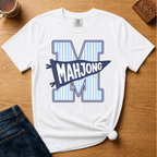 Mahjong Pennant Shirt in Blossom - giant striped varsity M with navy MAHJONG pennant banner on a pink Comfort Colors 1717 tee, flat lay