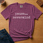 Pause Nevermind Typewriter Shirt in Black - pause... nevermind in distressed typewriter type on a black Comfort Colors 1717 tee, flat lay