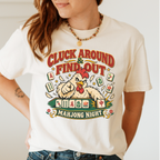 Cluck Around And Find Out Shirt in Ivory - fierce cartoon chicken behind a mahjong tile rack on an ivory Comfort Colors 1717 tee, flat lay