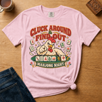 Cluck Around And Find Out Shirt in Blossom - fierce cartoon chicken behind a mahjong tile rack on a pink Comfort Colors 1717 tee, flat lay