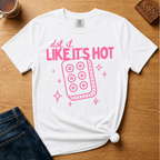 Dot It Like It's Hot Shirt in Black - pink dot it like it's hot lettering with a six-dot tile on a black Comfort Colors 1717 tee, flat lay