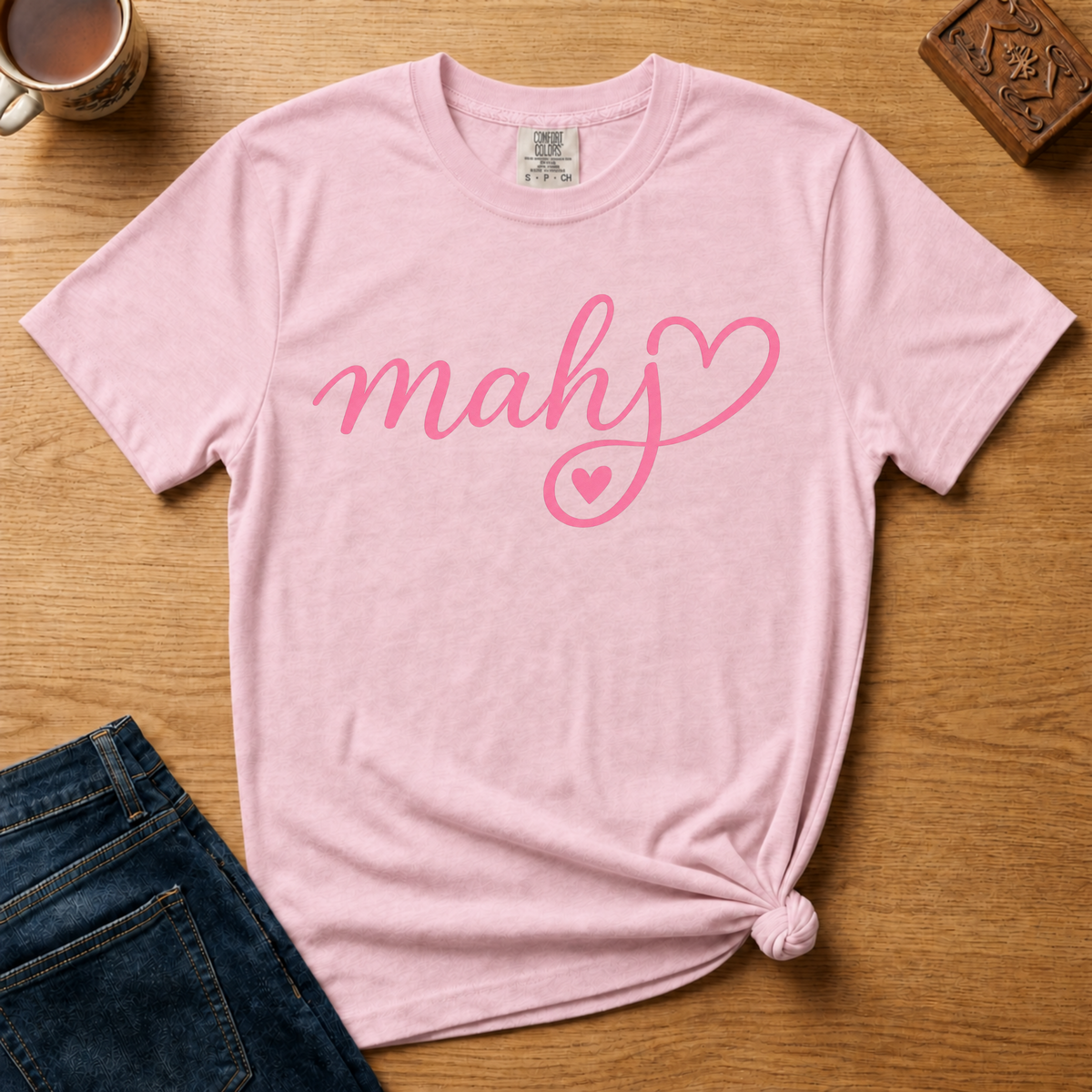 Mahj Heart Shirt in Black - pink mahj script with a heart flourish on a black Comfort Colors 1717 tee, flat lay
