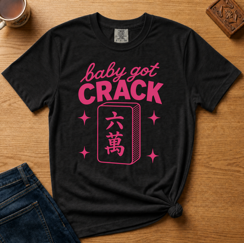 Baby Got Crack Shirt in Black - pink baby got crack lettering with a six-crack tile on a black Comfort Colors 1717 tee, flat lay