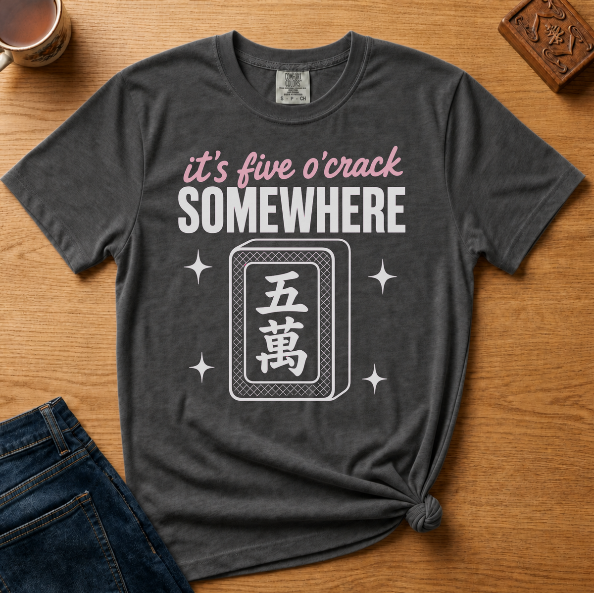 It's Five O'Crack Somewhere Shirt in Berry - pink and white five o'crack lettering with a five-crack tile on a berry Comfort Colors 1717 tee, flat lay