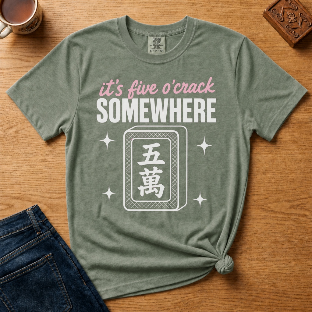 It's Five O'Crack Somewhere Shirt in Pepper - pink and white five o'crack lettering with a five-crack tile on a dark grey Comfort Colors 1717 tee, flat lay