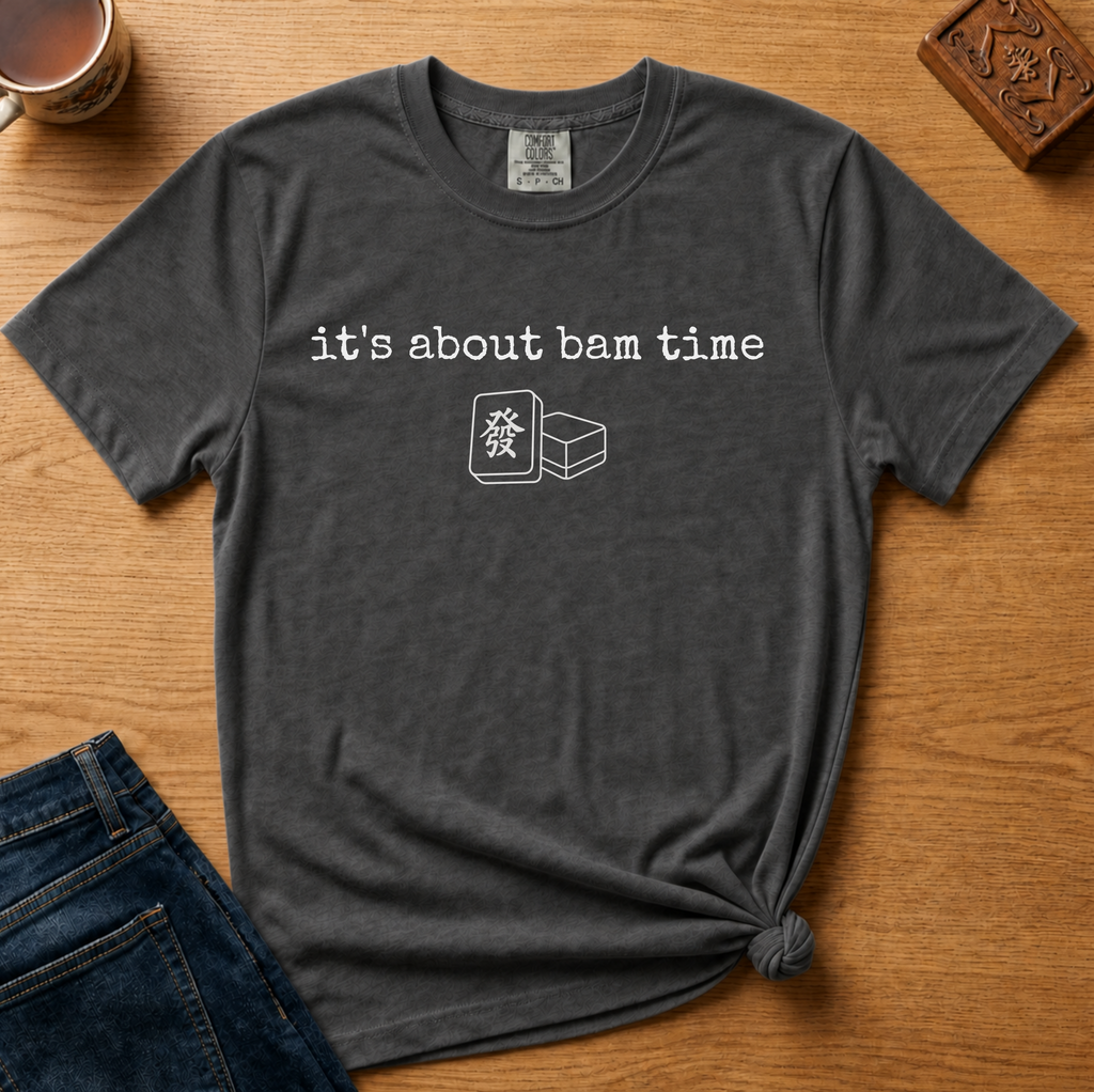 It's About Bam Time Shirt in Pepper - white typewriter text with a green dragon tile pair on a dark grey Comfort Colors 1717 tee, flat lay