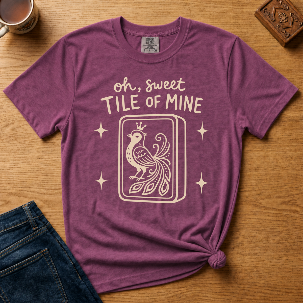 Oh Sweet Tile Of Mine Shirt in Espresso - cream oh sweet tile of mine lettering with a crowned peacock tile on a brown Comfort Colors 1717 tee, flat lay