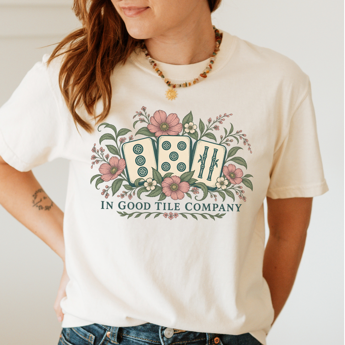 In Good Tile Company Shirt in White - three mahjong tiles in pink blossoms and green leaves with IN GOOD TILE COMPANY lettering