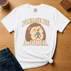 Close-up of the Please Be A Joker hedgehog design on a Moss Comfort Colors t-shirt.