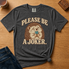 Close-up of the Please Be A Joker hedgehog design on a Pepper Comfort Colors t-shirt.
