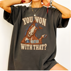 You Won With That horse mahjong shirt in Jean Blue, styled flat lay on a wooden table with jeans and coffee.