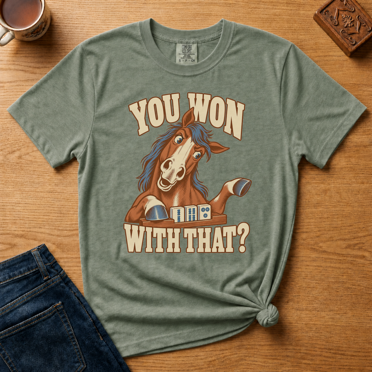 Close-up of the You Won With That horse design on an Espresso Comfort Colors t-shirt.