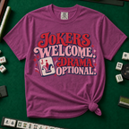 Jokers Welcome Drama Optional T-Shirt in White - knotted tee on a green mahjong mat with scattered tiles, printed with the words Jokers Welcome Drama Optional in retro bubble lettering with a joker tile