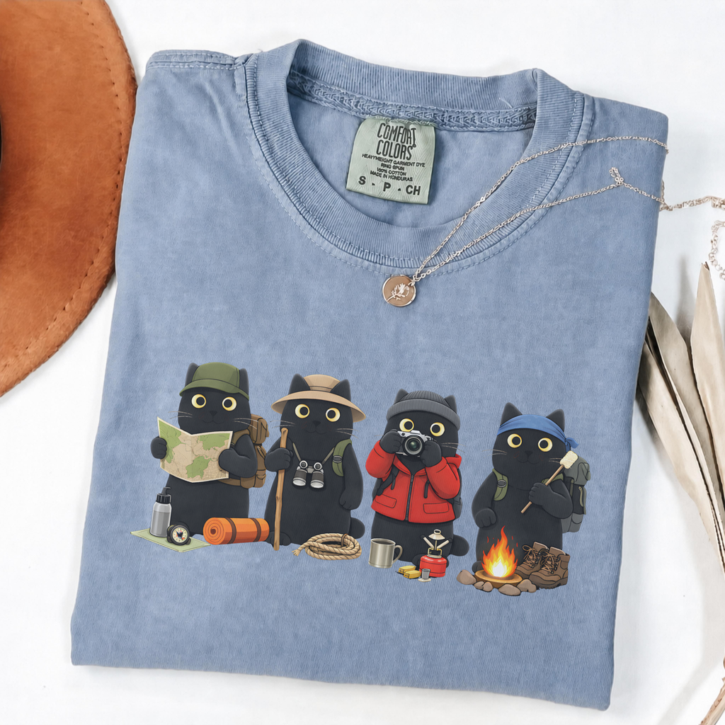 Four black cats hiking and camping on a Blue Jean Comfort Colors T-shirt