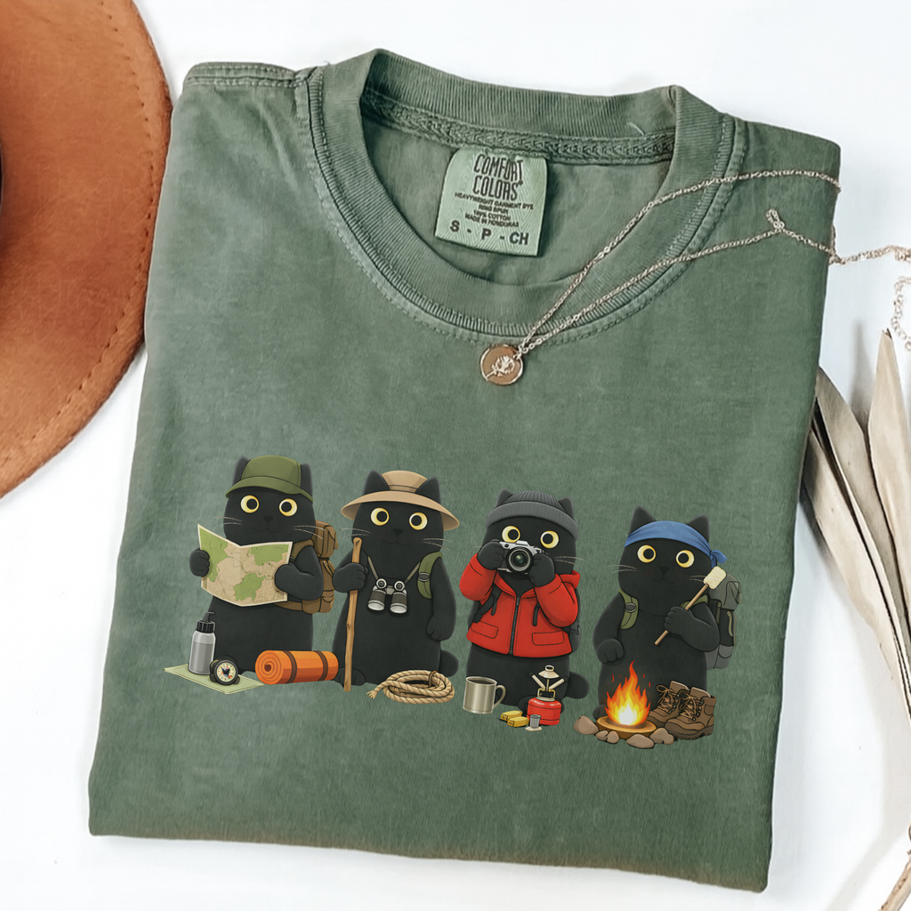 Four black cats hiking and camping on a Moss Comfort Colors T-shirt