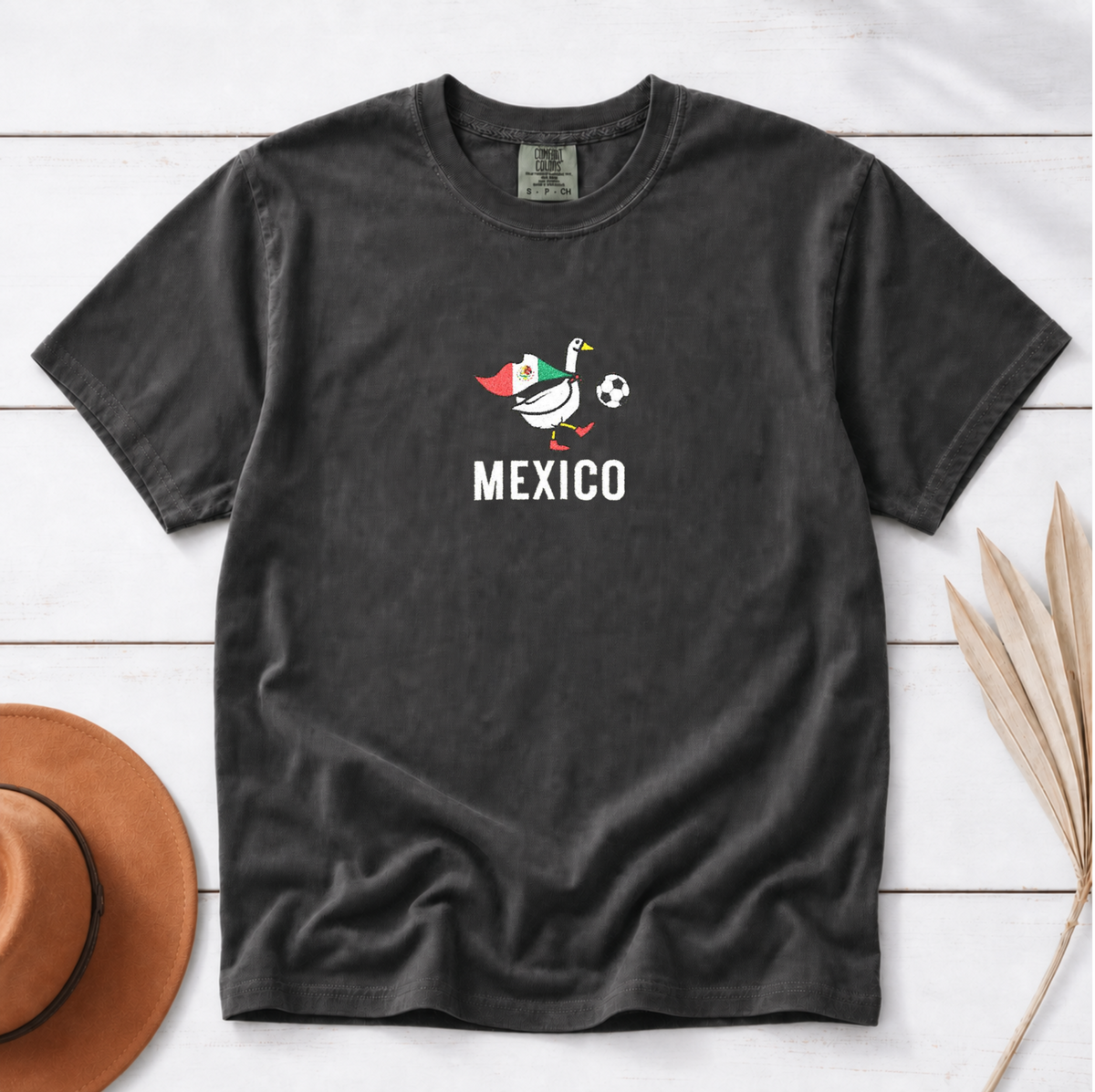 Mexico Soccer Goose embroidered shirt – Black styled flat lay