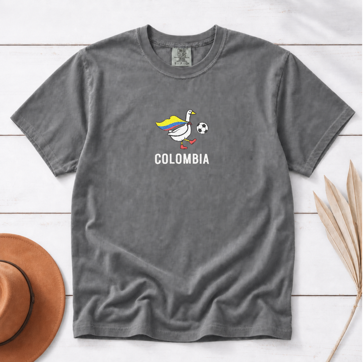 Embroidered Colombia Soccer Goose Shirt – Pepper flat lay