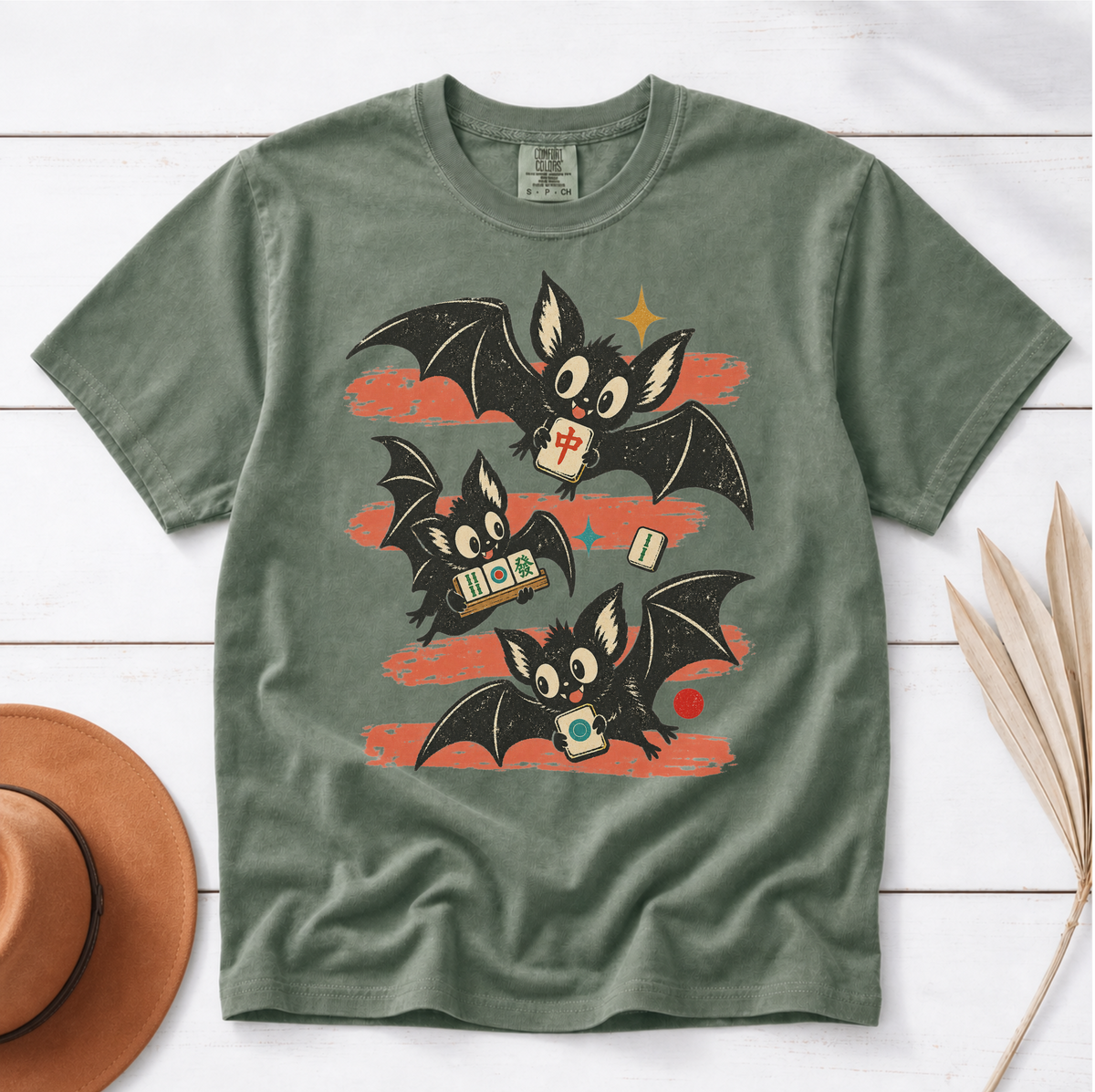 Bats Out mahjong Halloween shirt in Moss, flat lay