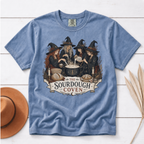 The Sourdough Coven shirt in Blue Jean, flat lay with four witches brewing sourdough