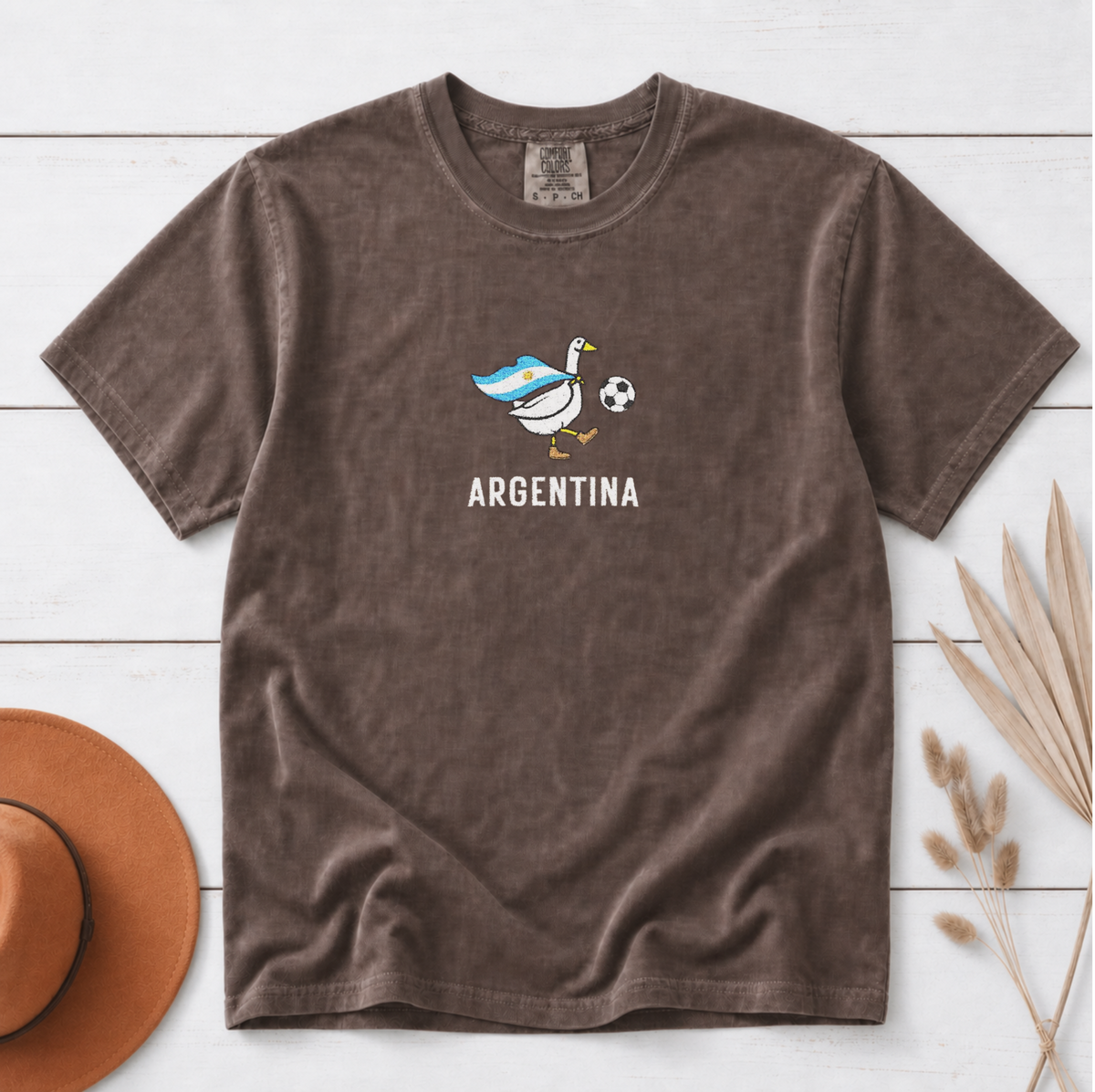 Embroidered Argentina Soccer Goose Shirt – Espresso flat lay