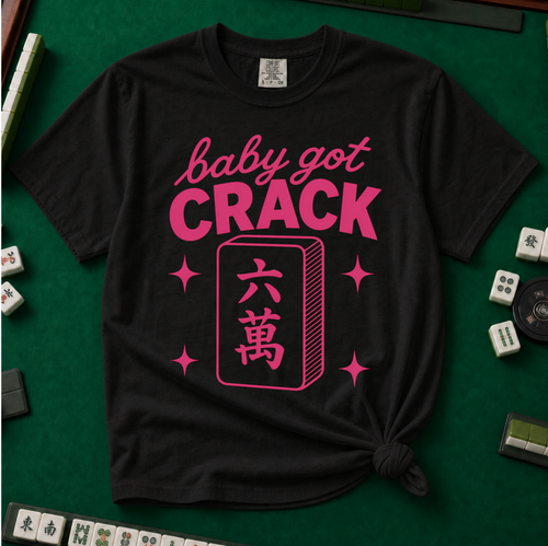 Baby Got Crack Shirt in Black - knotted tee on a light surface with mahjong tiles scattered around, printed with the words Baby Got Crack, Crack in big pink letters, with three small mahjong tiles