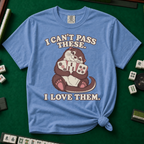 I Can't Pass These I Love Them T-Shirt in Blue Jean, knotted flat lay on a green mahjong mat - lovestruck otter hugging three mahjong tiles to her chest - "I CAN'T PASS THESE. I LOVE THEM." in cream retro letters