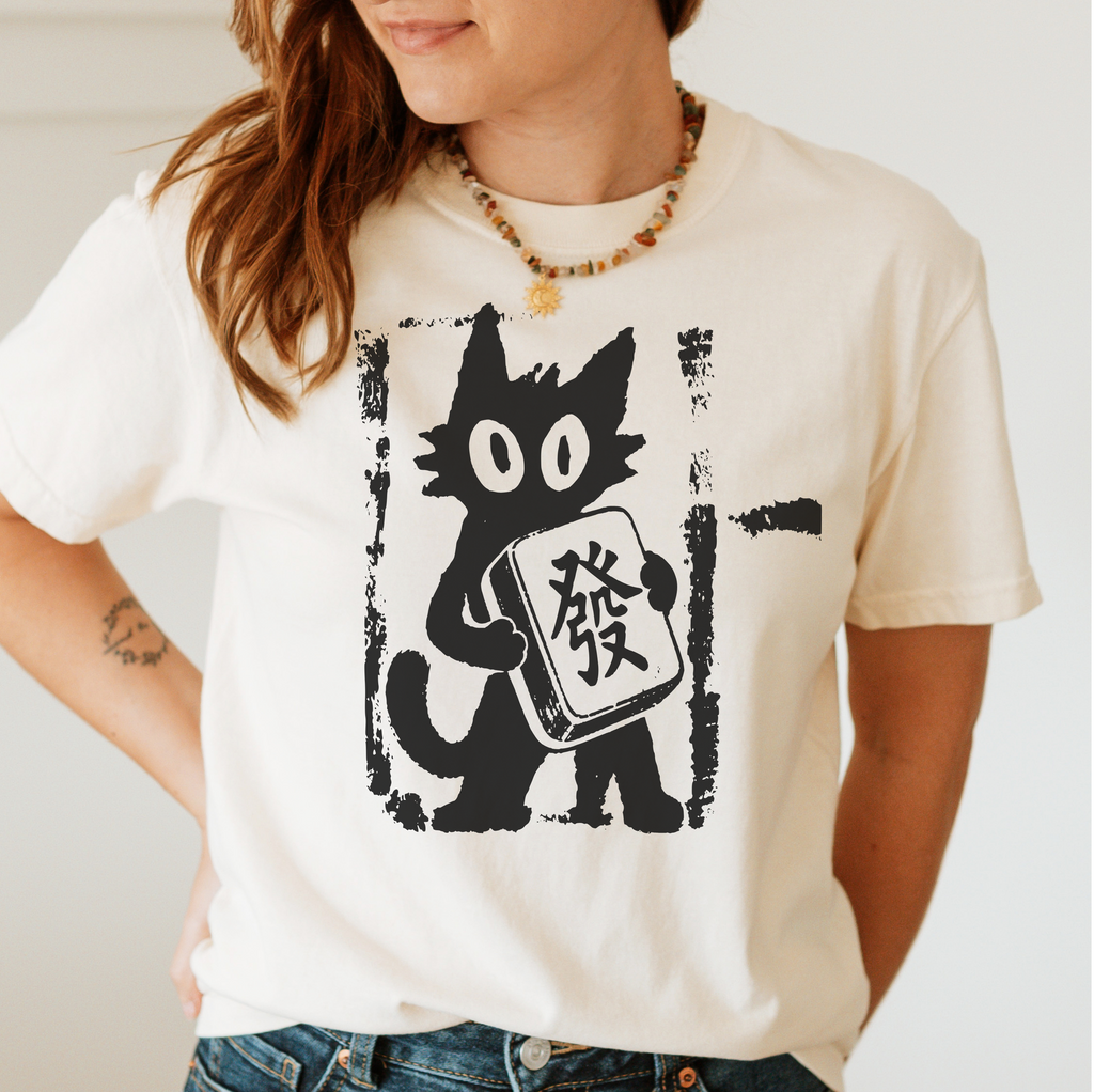 Model wearing Linocut Mahjong Cat T-Shirt in Ivory