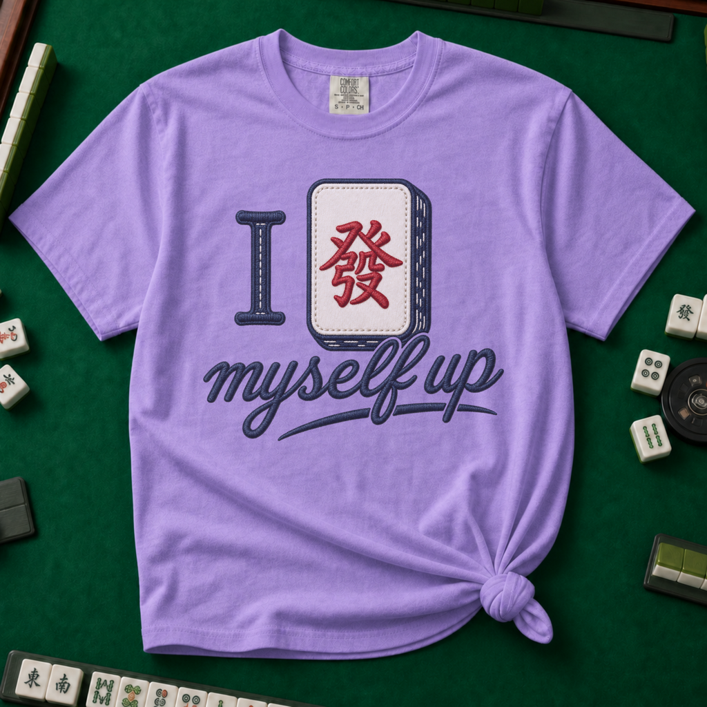 I Set Myself Up T-Shirt in Violet, knotted flat lay on a green mahjong mat - a stitched-look varsity rebus - a navy letter I beside a cream fa dragon tile with the red character, over "myself up" in navy script