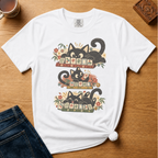 Retro Black Cats Mahjong Shirt in White - three black cats over a row of mahjong tiles with arched MAHJONG lettering